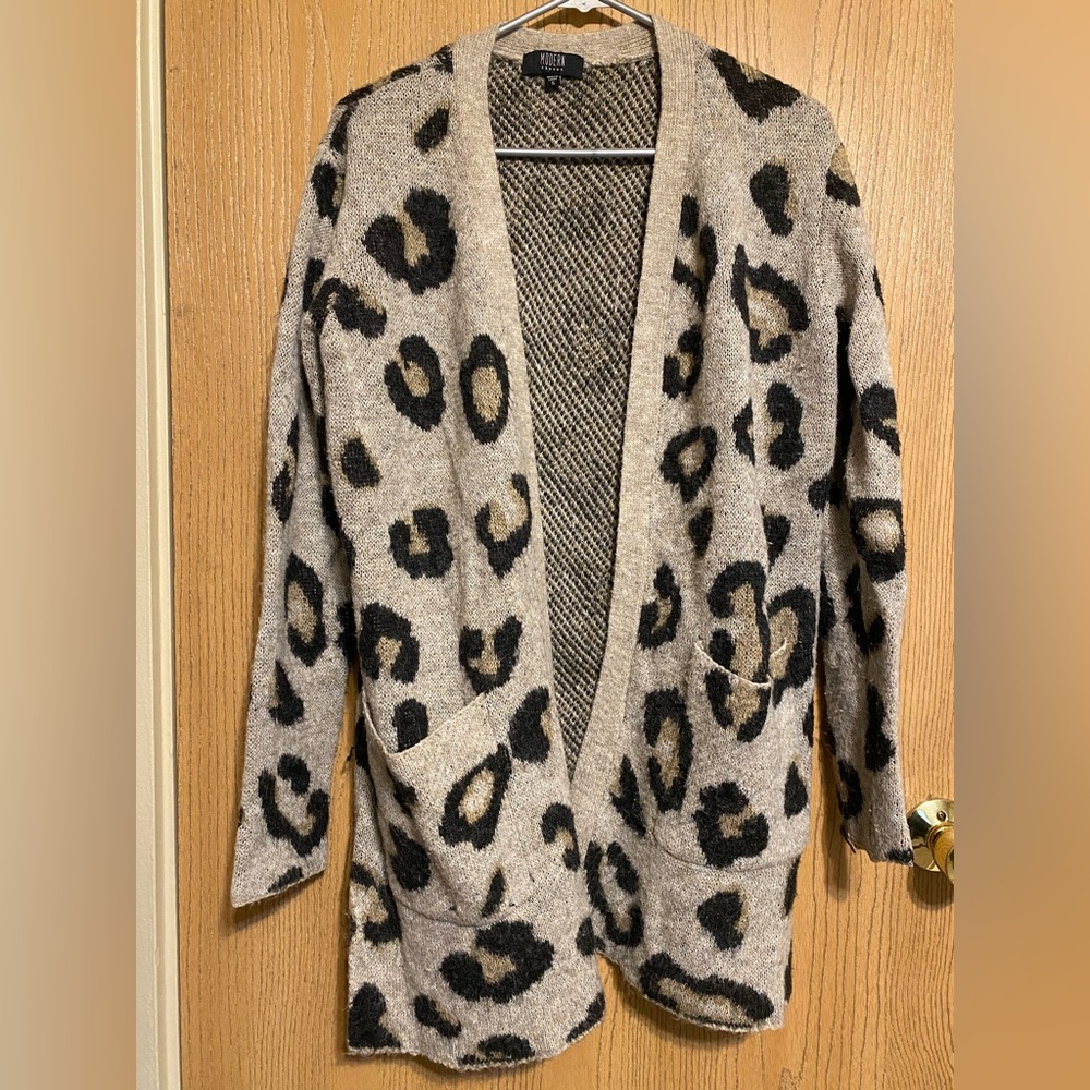Small animal print long cardigan.

Fair to good condition! No longer need it.
